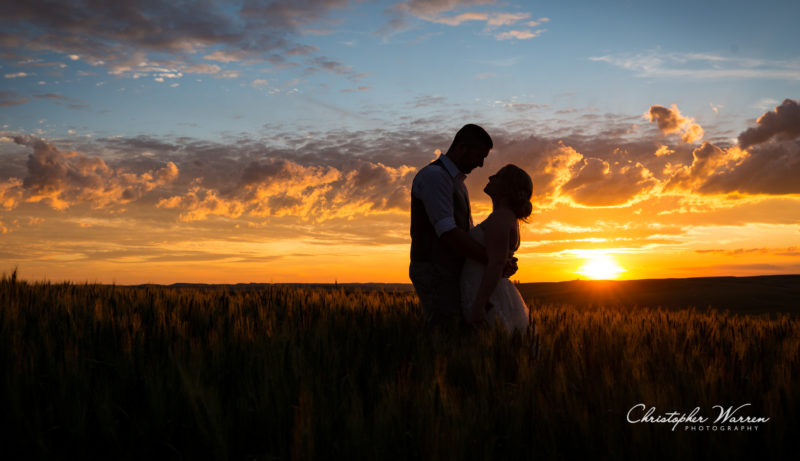 bride and groom sunset silhouette