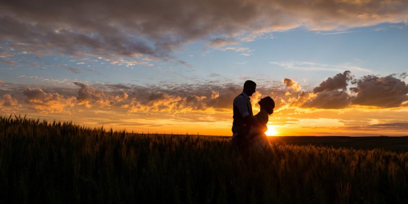 Bride and groom in sunset