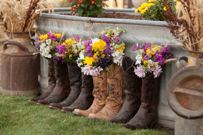 wedding decor of boquets in boots